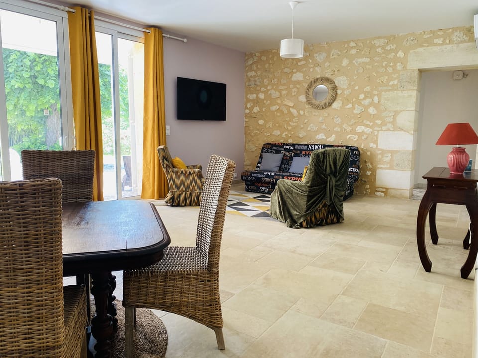 Superior Apartment, 2 Double Beds, Terrace | Living area | 50-inch Smart TV with digital channels, TV, books