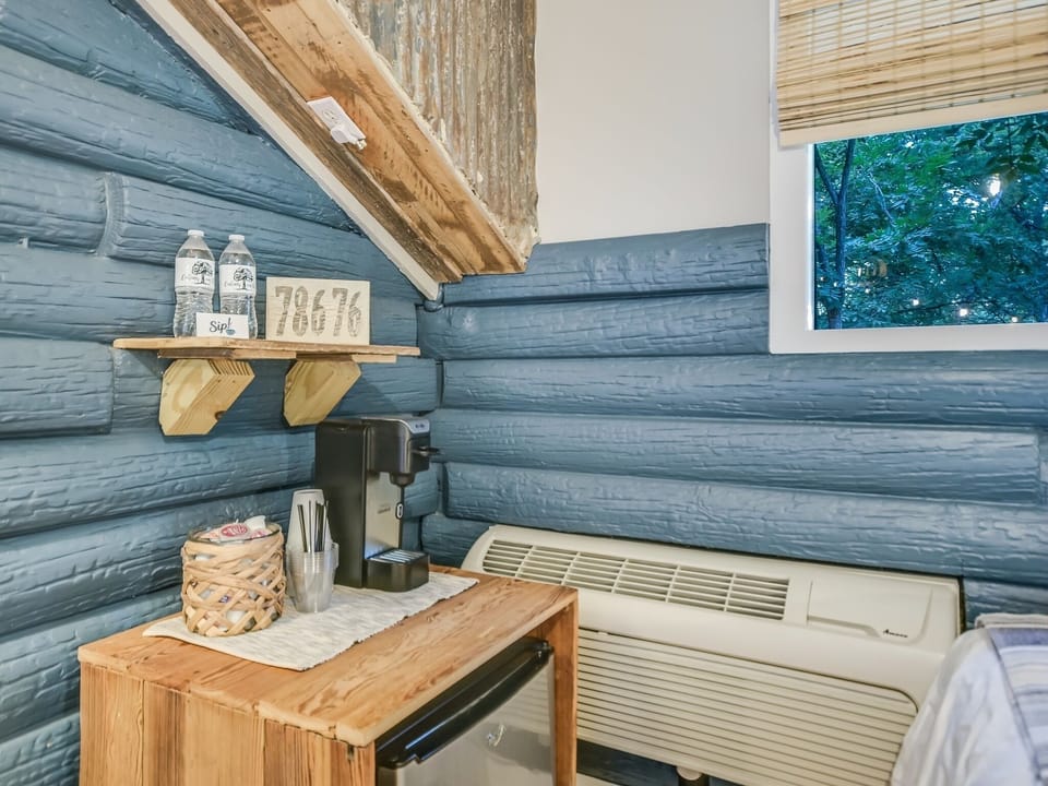 Curated Hill Country details at the Nature Suite — handcrafted shelving and Wimberley local touches (zip code 78676) at Cabins on the Square.
