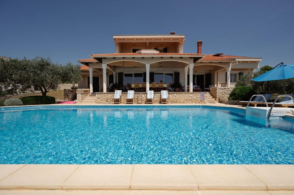 Villa | Private kitchen | Coffee/tea maker, highchair