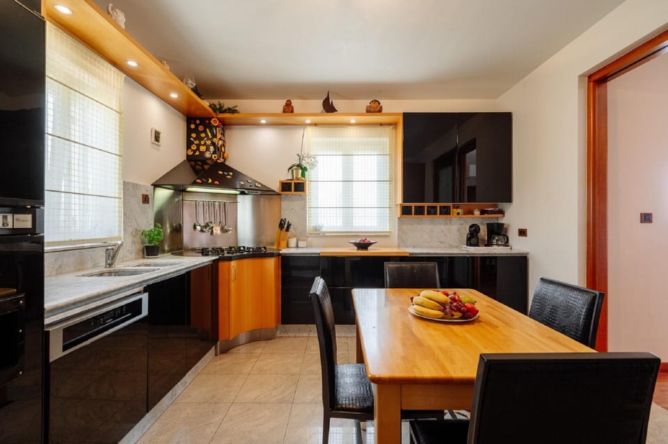 Villa | Private kitchen | Coffee/tea maker, highchair