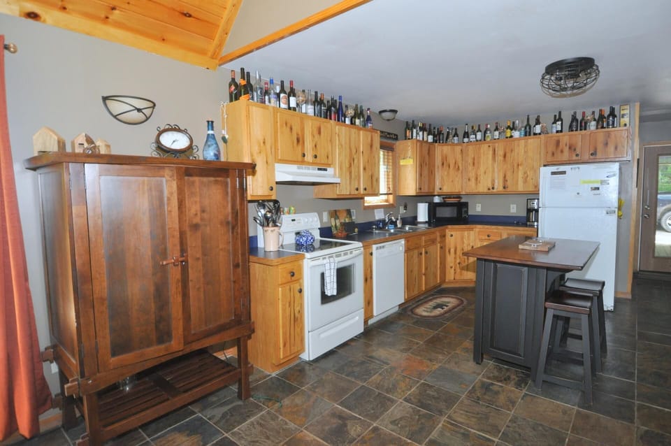 House, Multiple Beds (Sqyrls Nest - 3BR Retreat With a Hot ) | Private kitchen | Fridge, dishwasher, freezer, spices