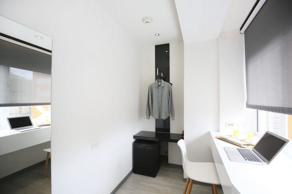 Deluxe Triple Room, Bathtub, City View | Down comforters, in-room safe, desk, blackout drapes