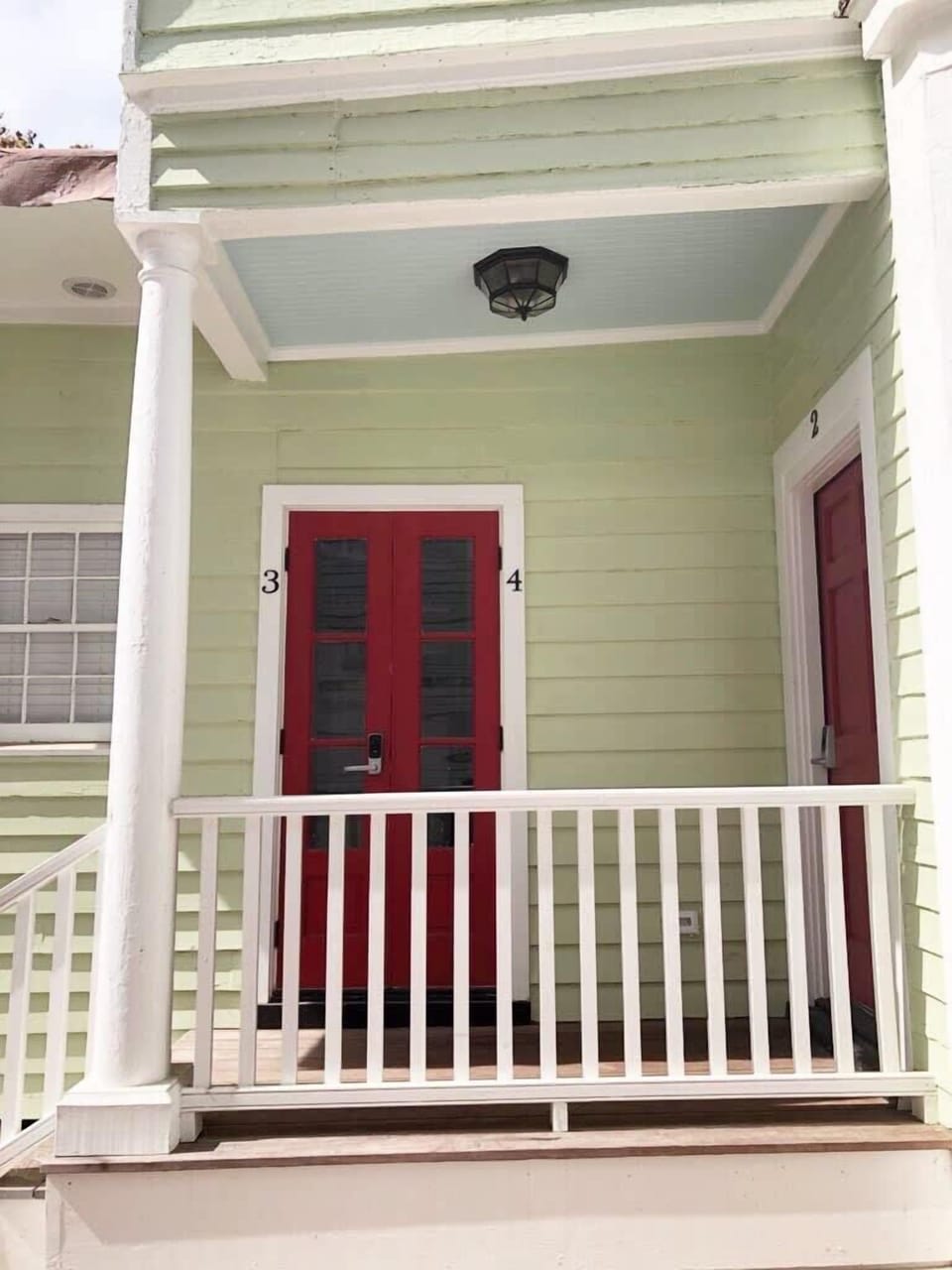 private entrance at French doors leading to suite