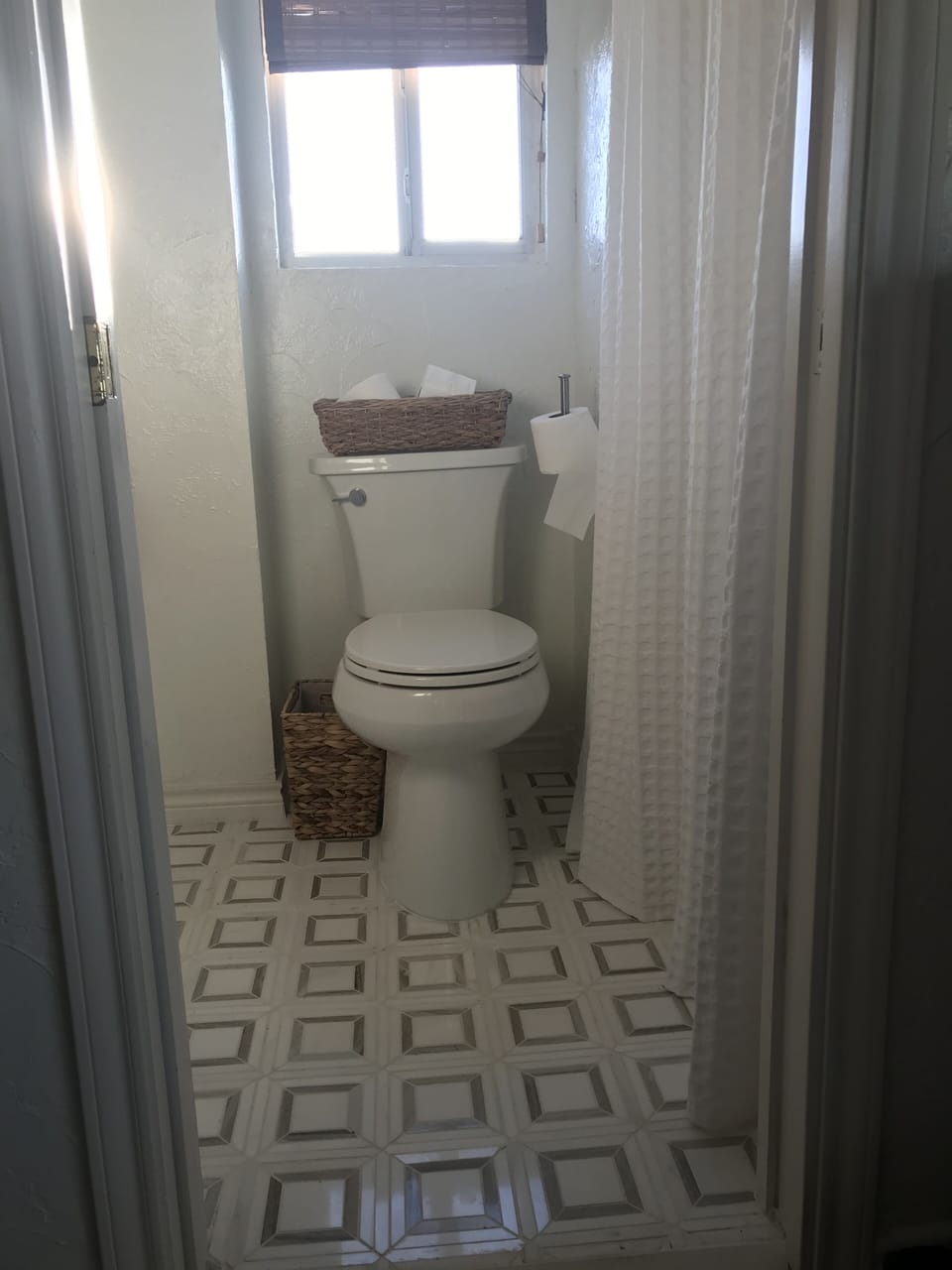Master bathroom with stylish new flooring and toilet. Beach Views too!