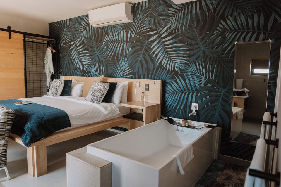 Luxury Suite, 1 Bedroom | Bathroom | Separate tub and shower, free toiletries, hair dryer, bathrobes