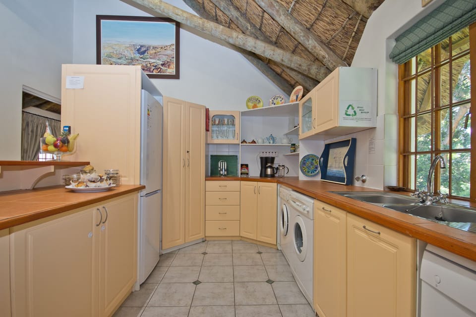 Family Cottage, 2 Bedrooms | Private kitchen | Electric kettle, eco-friendly cleaning products