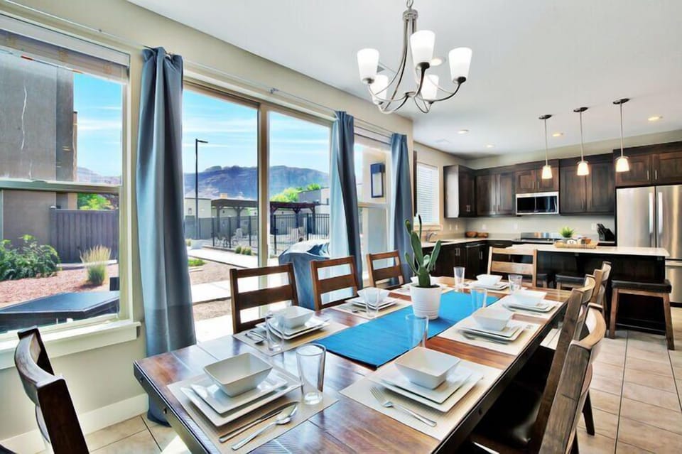 619 Classy Dining Area and a Clean and well equipped Kitchen with Island Top