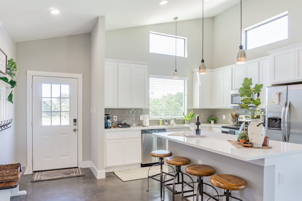 Front door enters into the kitchen 

