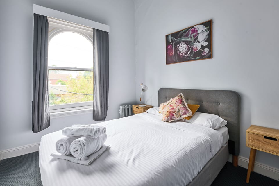 Economy Double Room, Shared Bathroom | Iron/ironing board, bed sheets