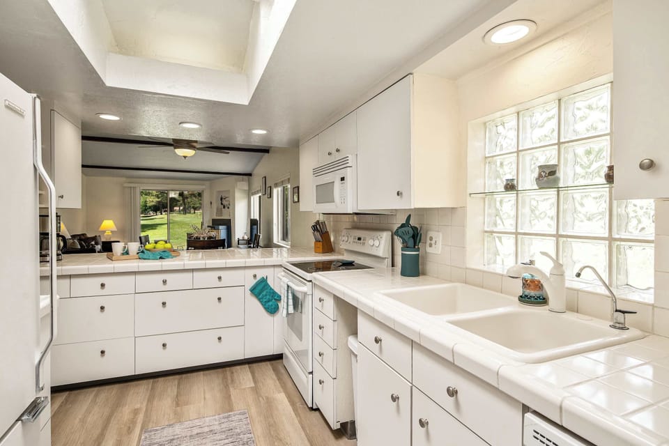 Well stocked kitchen with plenty of counter and cabinet space
