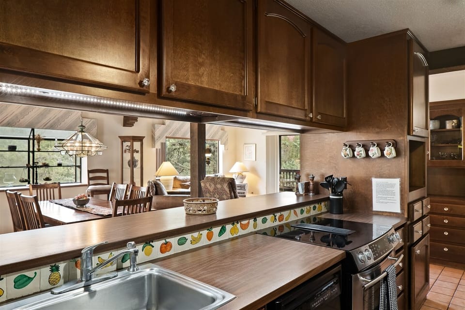 The kitchen opens to the dining area