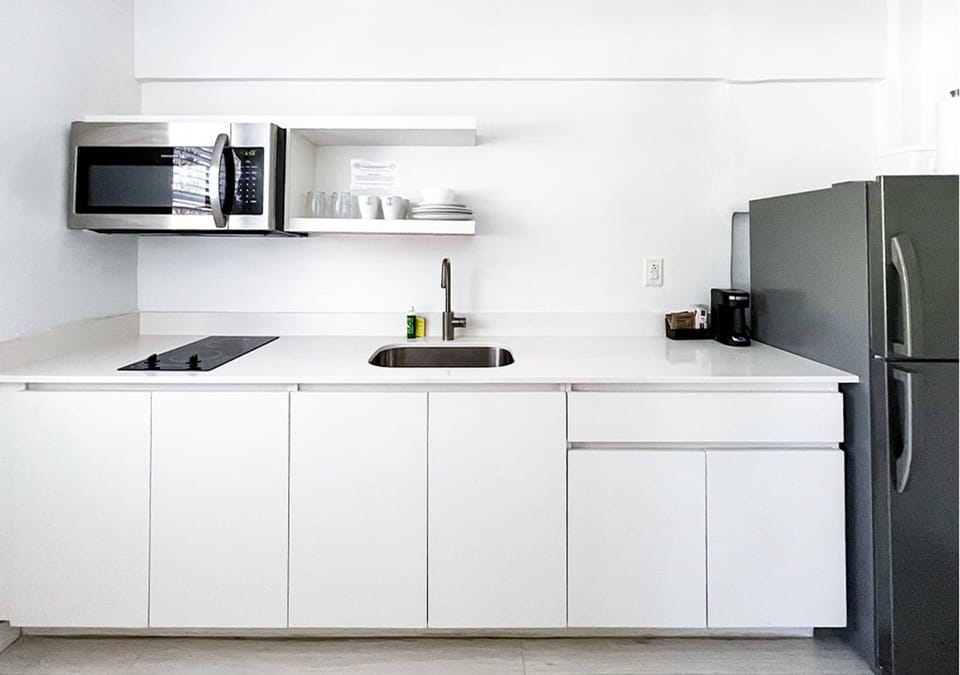 Suite, 1 Bedroom (1 King Bed) | Private kitchen | Fridge, microwave, coffee/tea maker, paper towels