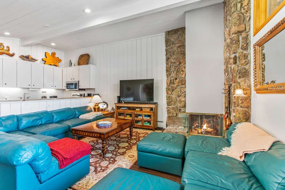 The large sectional sofa provides plenty of space to unwind by the fire at the end of a long day exploring the area.