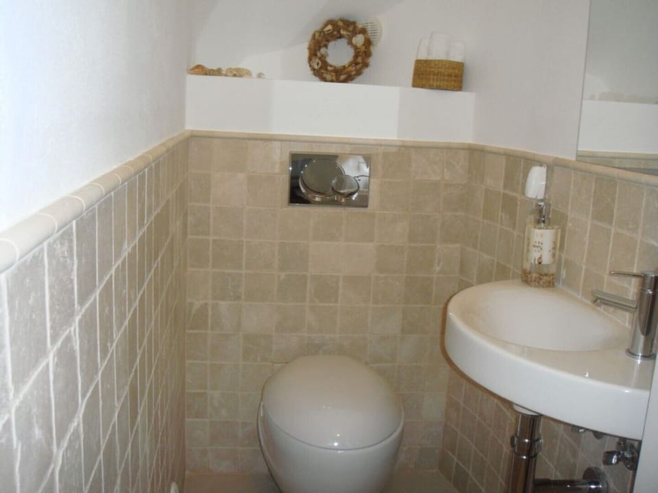 Separate toilet in the hallway.