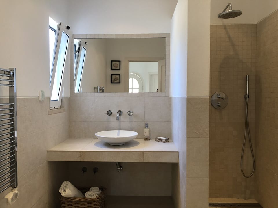 Bathroom #1 with shower, bidet and toilet.