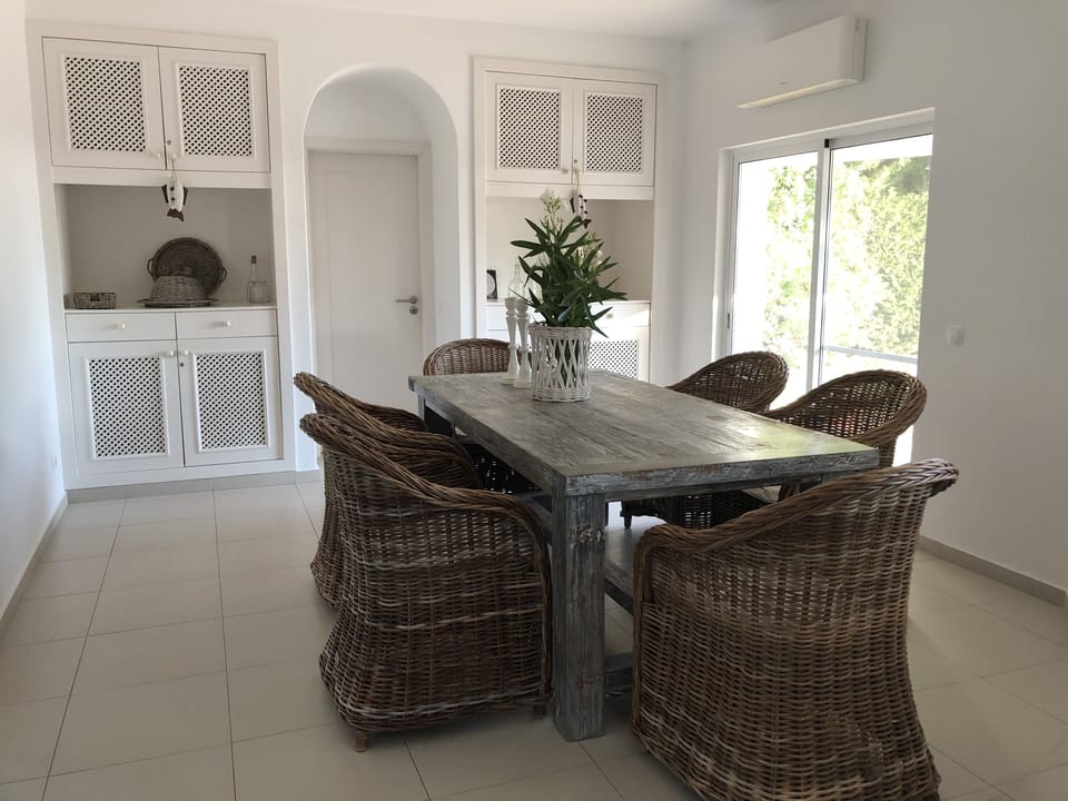 Dining area has connection with the laundry.