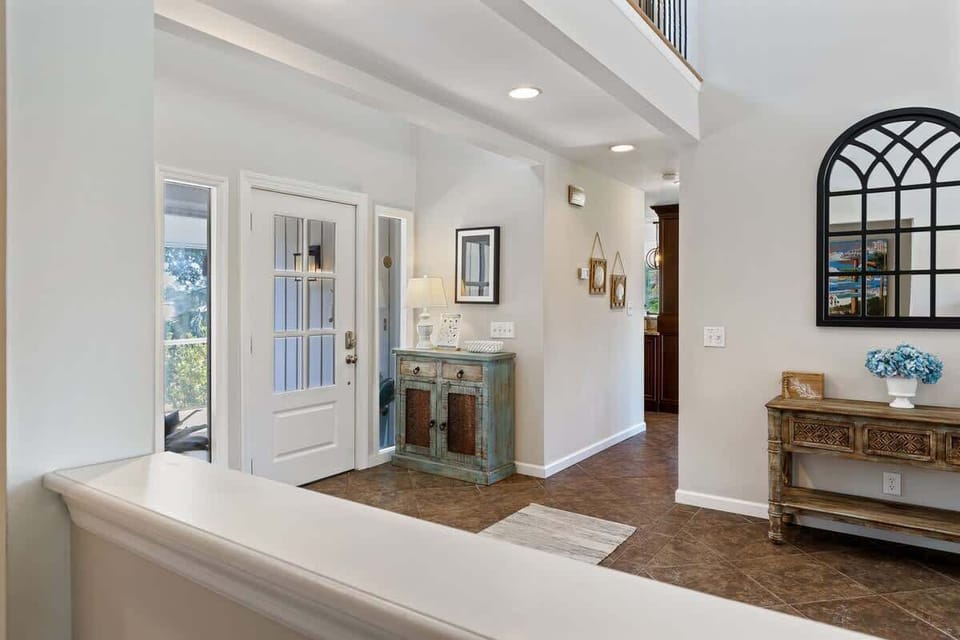 Entrance and Hall Toward Guest Bathroom and Common Areas