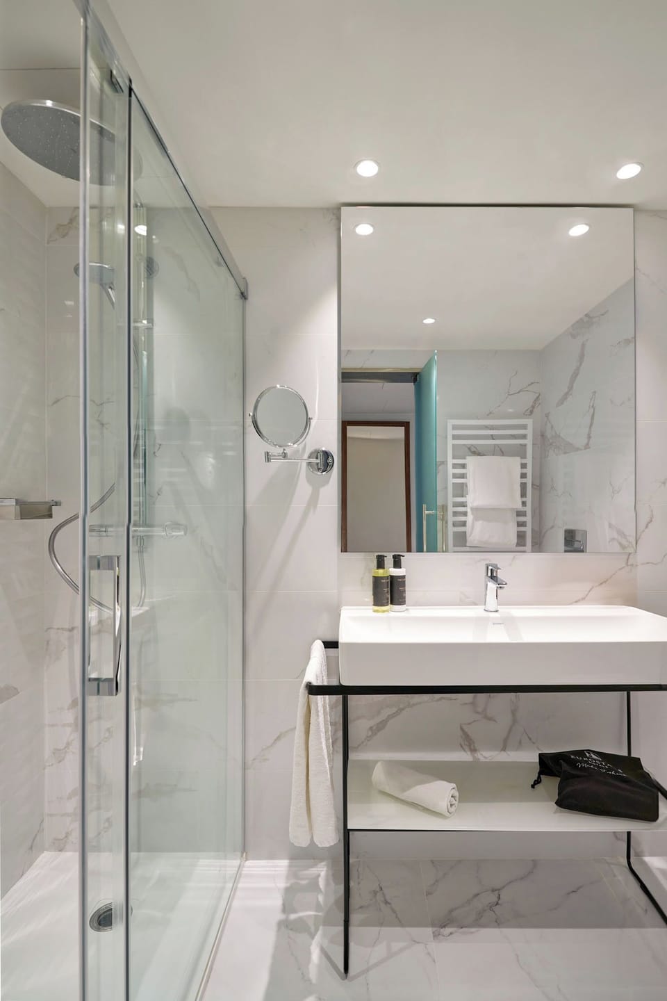 Combined shower/tub, eco-friendly toiletries, hair dryer, towels