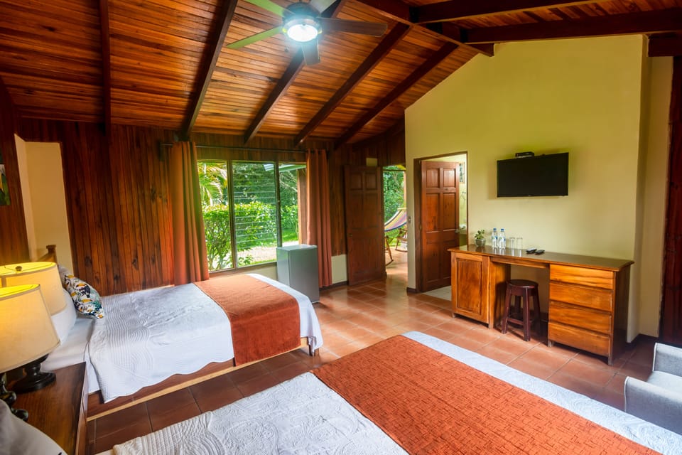 Standard Room, 2 Double Beds, Garden View | Minibar, desk, blackout drapes, free WiFi