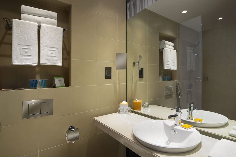 Shower, eco-friendly toiletries, hair dryer, bidet