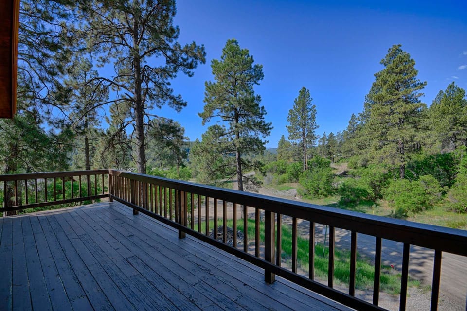 Large wooden balcony from upstairs bedroom access