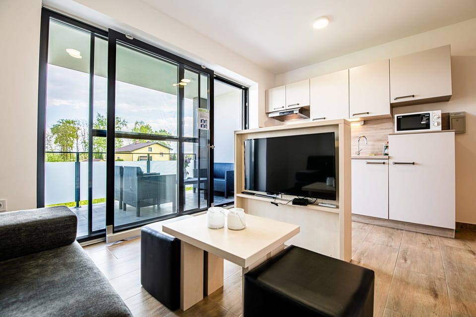 Apartment | Living area | Flat-screen TV, heated floors