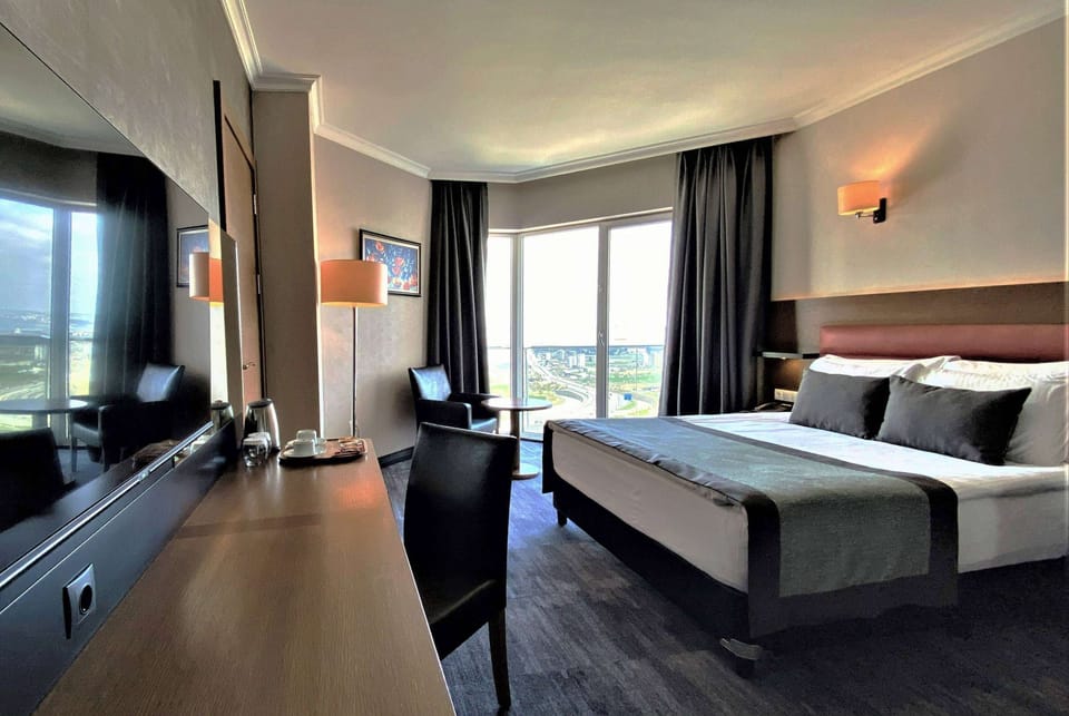 Deluxe Room, 1 King Bed, Accessible, Non Smoking (Sea and City View) | Premium bedding, down comforters, in-room safe, desk