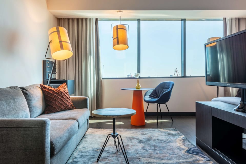 In-room safe, laptop workspace, blackout drapes, soundproofing