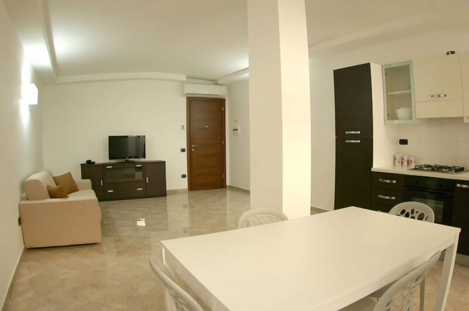 Standard Apartment, 2 Bedrooms | Living room | 32-inch LCD TV with digital channels, TV