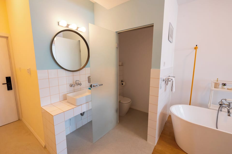 Romantic Double Room | Bathroom | Bathtub, hair dryer, towels, soap