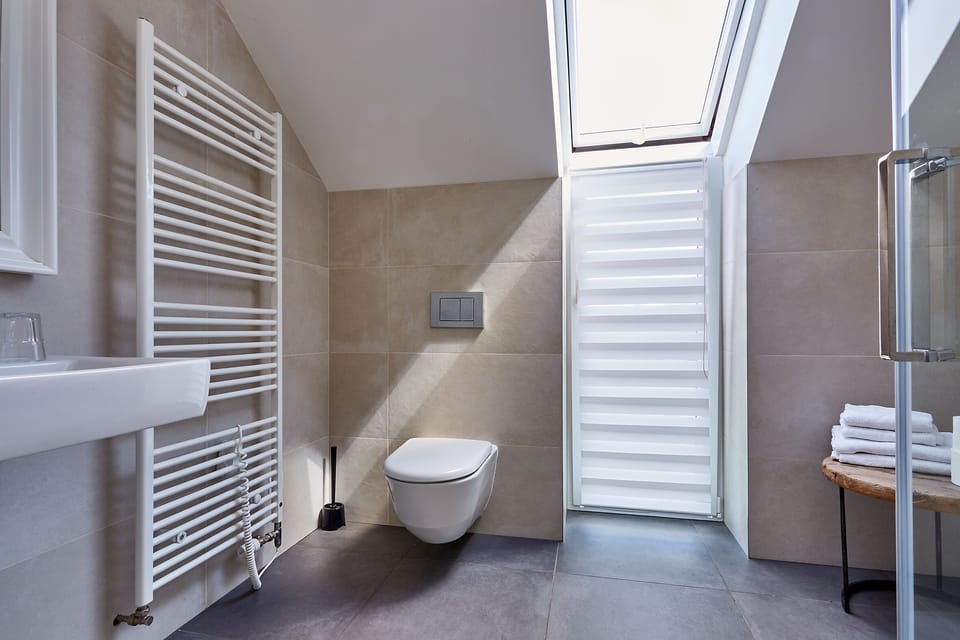 Family Apartment | Bathroom | Free toiletries, hair dryer, towels, soap