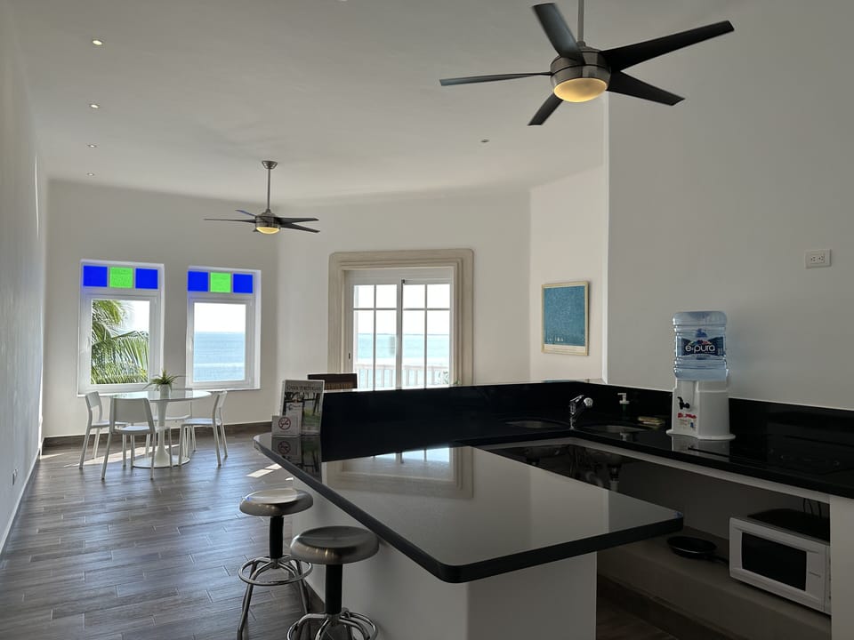 Master Suite, 1 King Bed | Private kitchen | Mini-fridge, microwave, stovetop, coffee/tea maker