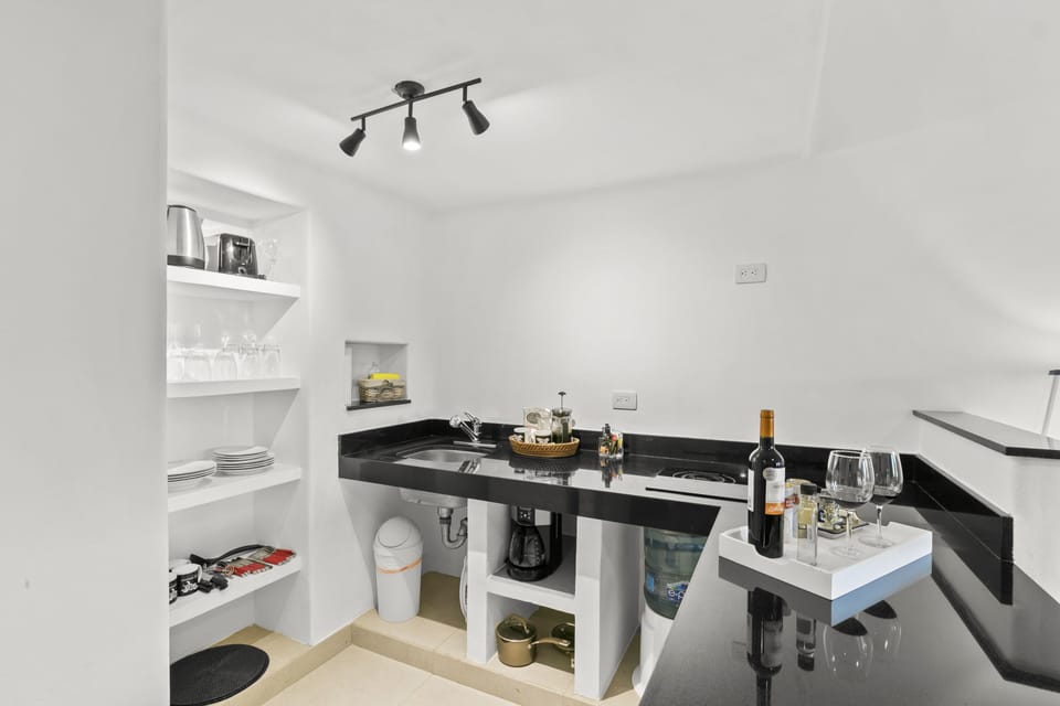 Studio, 2 Double Beds | Private kitchen | Mini-fridge, microwave, stovetop, coffee/tea maker