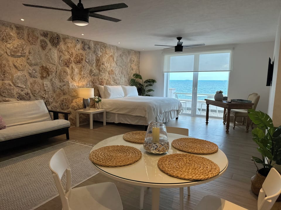 Luxury Suite, Balcony, Ocean View | Living area | TV, Netflix, streaming services