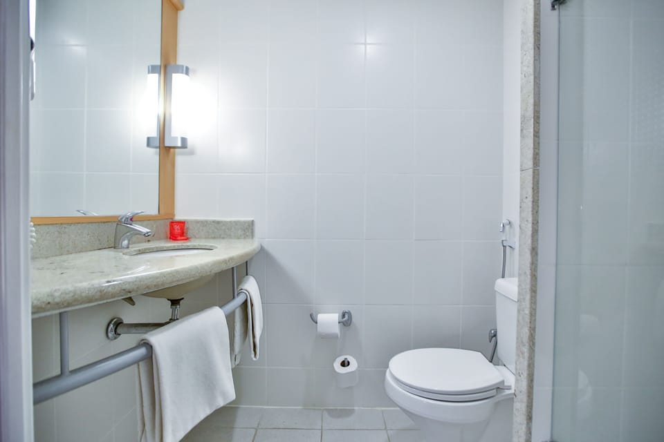 Standard Room, Multiple Beds | Bathroom | Shower, eco-friendly toiletries, hair dryer, towels