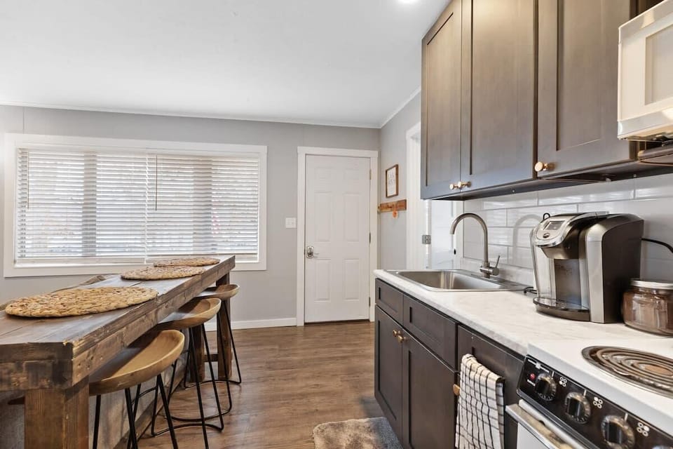 Kitchen stocked with your basic cookware and utensils