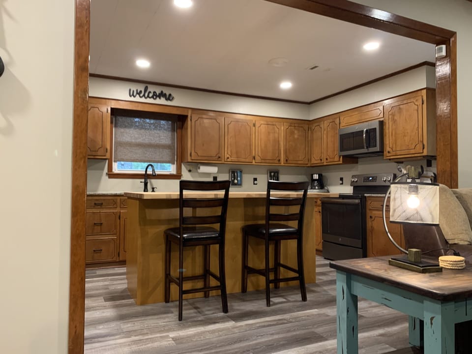 Gather around the butcher block island. 