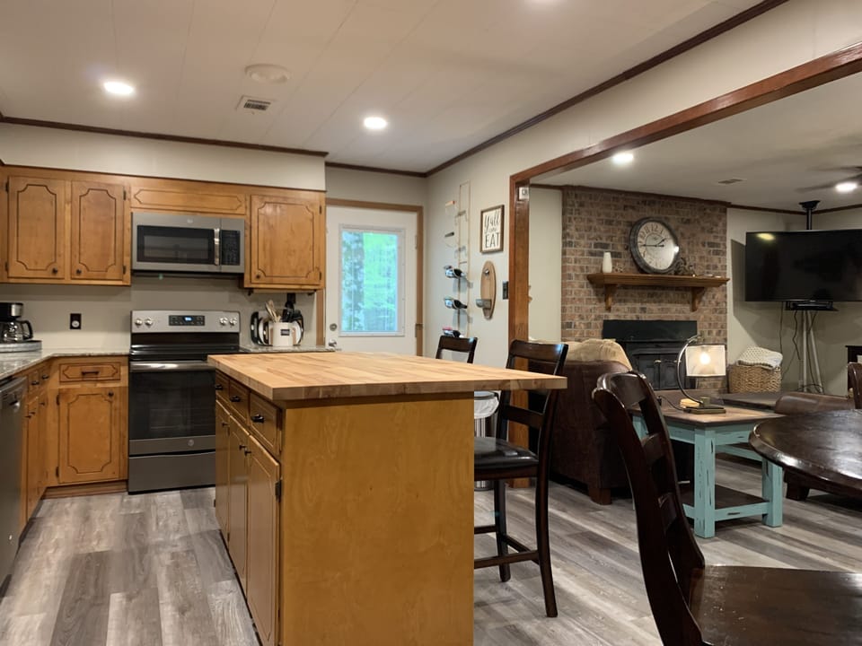 Range & oven, dishwasher, microwave & refrigerator all new stainless appliances