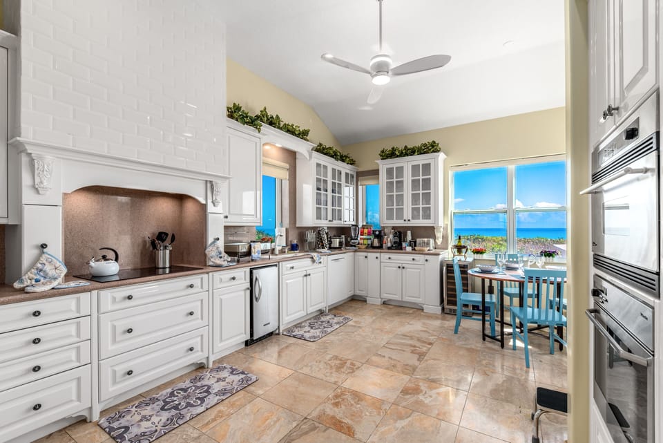 Newly renovated chef's kitchen with ocean views and outdoor grilling station