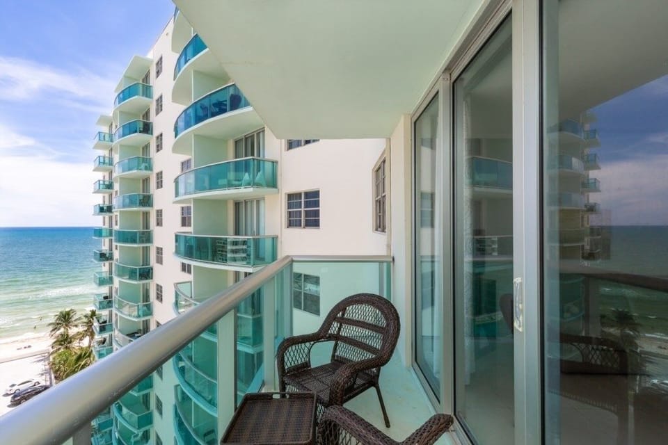 Chair, Furniture, Balcony, Building, City