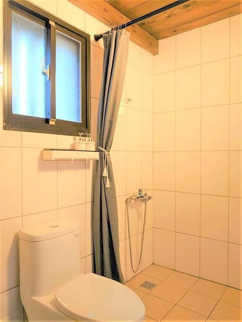 Shower, free toiletries, hair dryer, slippers