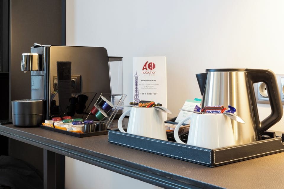 Deluxe Room | Minibar, in-room safe, individually furnished, desk