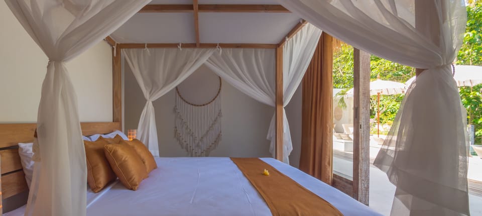 The villa has 3 bedrooms with a king bed and 2 connecting bedrooms with bunk bed