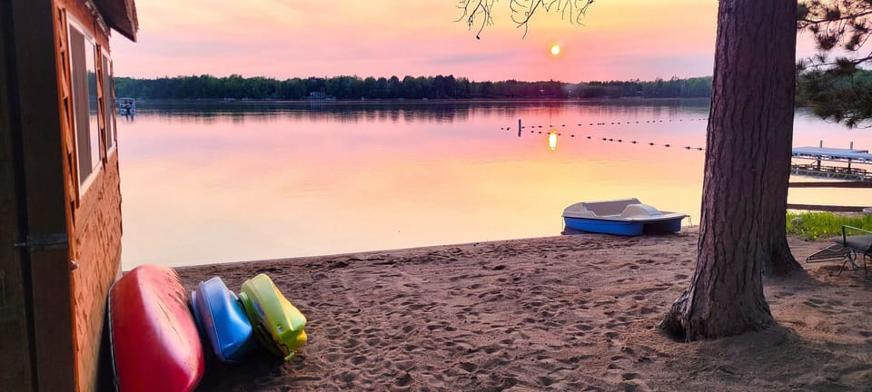 Full Sand Beach, Level Frontage, Sand Bottom lake area- no rocks or weeds. 
