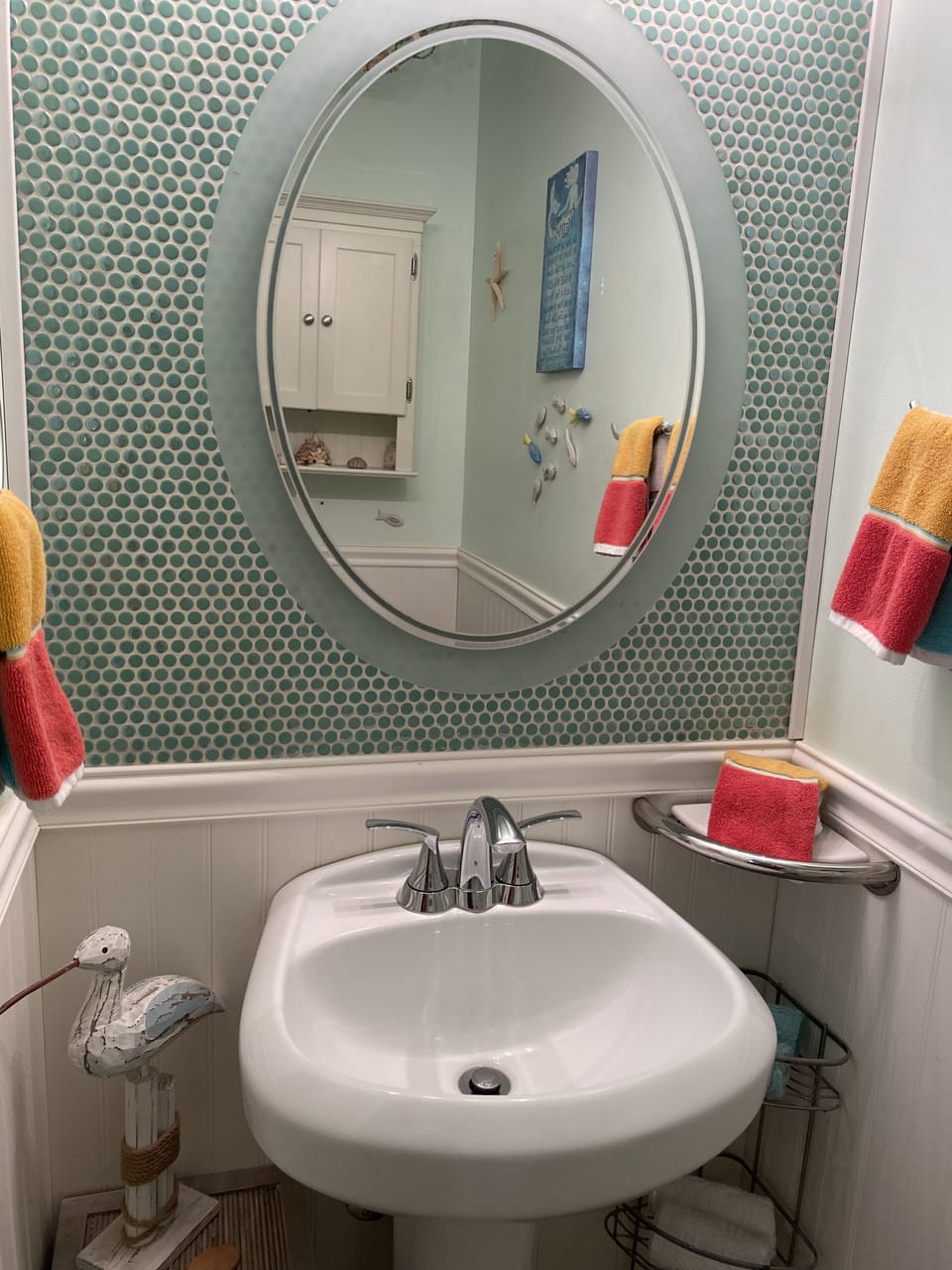Half bathroom in living room area.