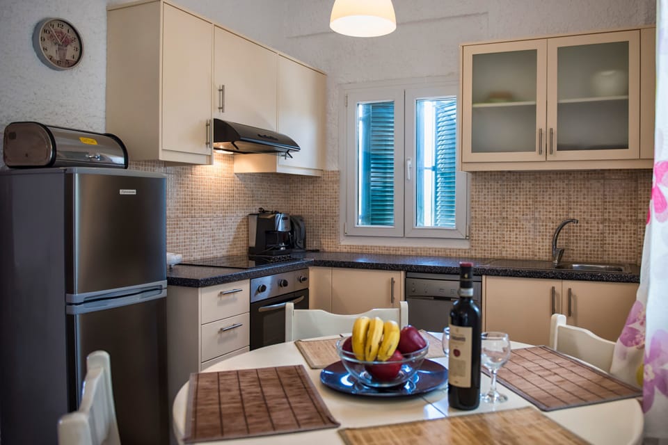 Apartment, 2 Bedrooms, Sea View | Living area | 24-inch flat-screen TV with satellite channels, LED TV