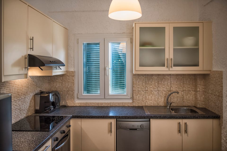 Apartment, 2 Bedrooms, Sea View | Living area | 24-inch flat-screen TV with satellite channels, LED TV