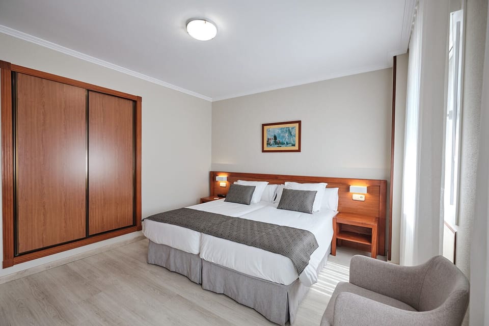 Standard Double or Twin Room, Private Bathroom | In-room safe, desk, laptop workspace, blackout drapes