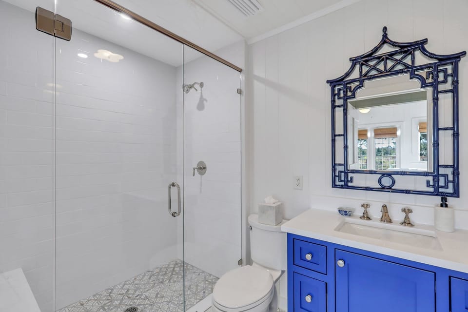 Primary en suite bath with walk in shower on the third floor
