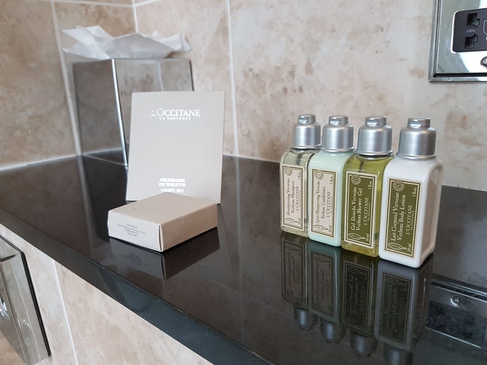 Suite | Bathroom | Designer toiletries, hair dryer, towels
